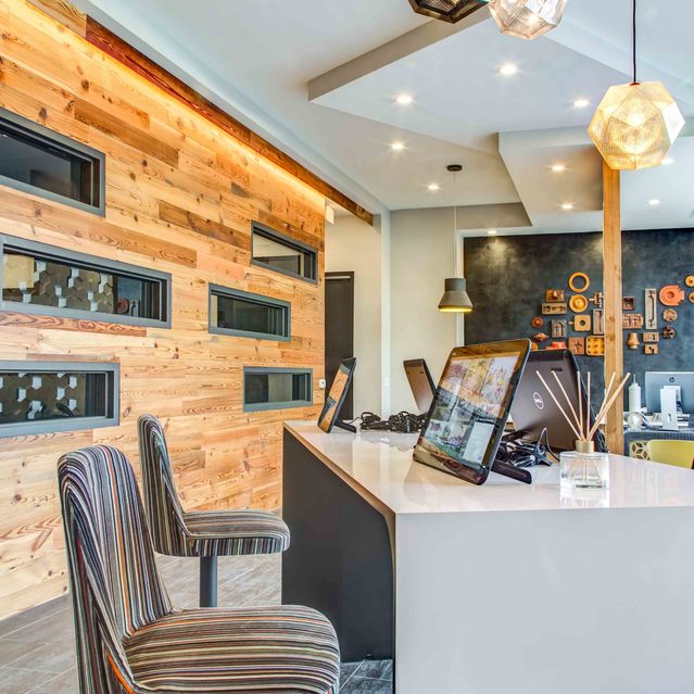 The Arnold - Business Center with Wooden Wall Accent