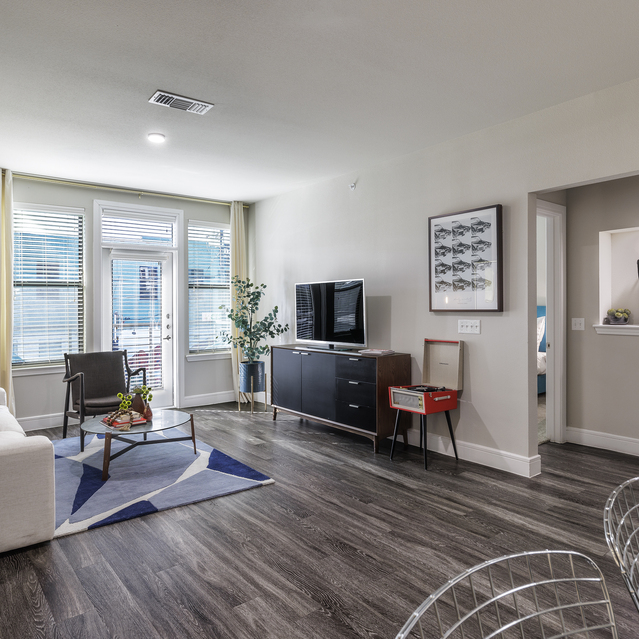 The Arnold - Living Area View with Access to Balcony